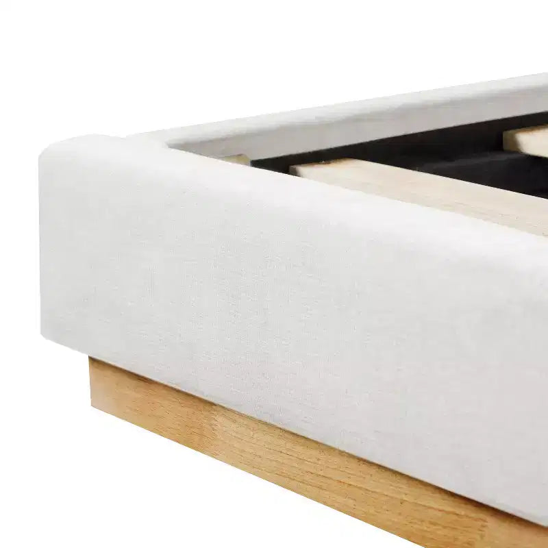 Estructura de cama King Size tapizada en chenilla minimalista, patas de madera maciza de caucho, blanca
